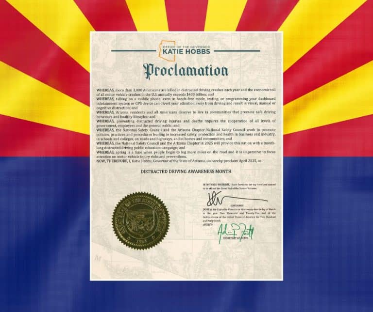 Proclamation in front of the Arizona state flag.