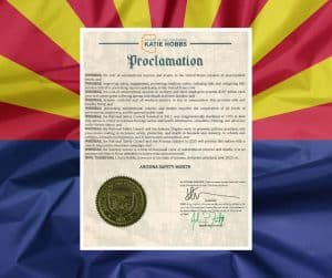National Safety Month proclamation in front of the Arizona state flag.