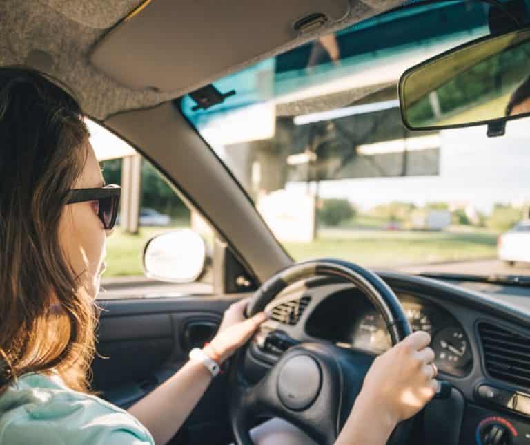 Woman driving a car.